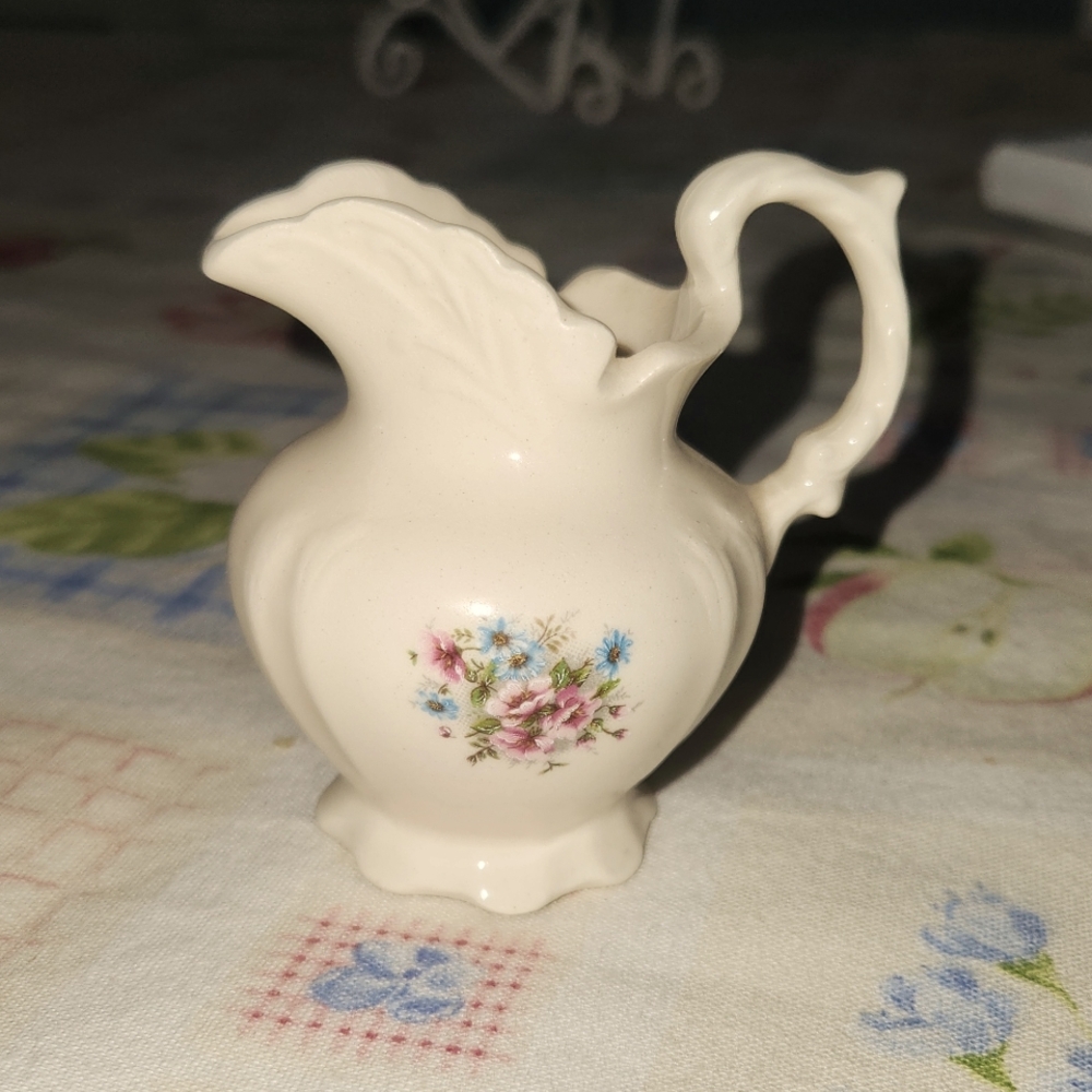 Tiny pitcher for display or accent piece.